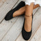 Chaussures plates noires en tissu pour femme