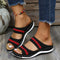 Sandales noires à talons compensés avec motifs rouges pour femme