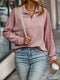Pull en maille côtelée rose à col zippé pour femme