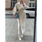 Manteau long blanc à double boutonnage pour femme