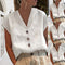 Blusa in lino bianco a maniche corte con bottoni