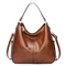 Bolso de mano de cuero marrón con bandolera ajustable
