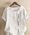 Blusa in lino bianco a maniche corte con bottoni decorativi