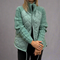 Green quilted jacket with knitted sleeves for women