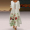 Robe longue blanche à manches longues avec motif floral