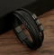 Bracciale in pelle nera intrecciata con chiusura magnetica