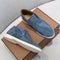 Chaussures en daim bleu pour homme avec semelle blanche