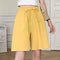Short en lin jaune pour femme avec ceinture à nouer