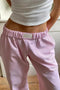 Pantalón de descanso a rayas rosa para mujer