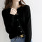 Cardigan in lana nero da donna con bottoni argentati