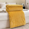 Couverture en peluche jaune texturée pour lit ou canapé