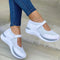 Chaussures de sport blanches pour femme avec sangle ajustable