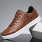 Chaussure de sport marron en cuir synthétique pour homme
