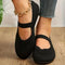 Chaussures plates noires en maille pour femme