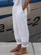 Pantalon en lin blanc avec broderie pour femme