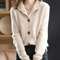 Gilet en laine beige à boutons pour femme